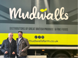 George Mudwalls & Chris Bavin in front of a mudwalls van
